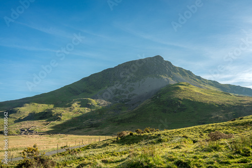 Mountain view of Y Garn from the fishing lake of Llyn Dywarchen in the Eryri National Park, Wales.
