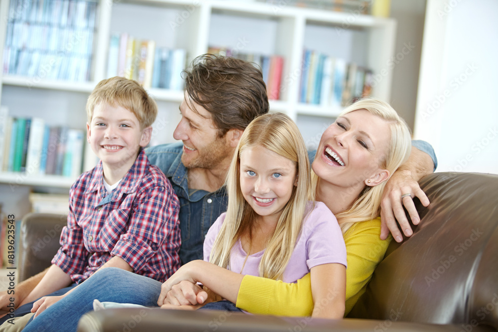 Happy family, laughing and relax with hug on sofa for bonding, holiday or weekend together at home. Mother, father and children with smile for love, care or summer break on living room couch at house Happy family, laughing and relax with hug on sofa for bonding, holiday or weekend together at home. Mother, father and children with smile for love, care or summer break on living room couch at house