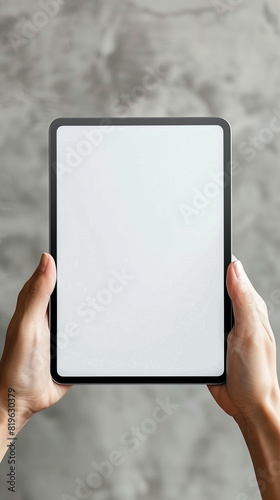 digital tablet with white screen on hand photo