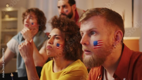 American fans watching match on tv, cheering for USA team. European Games and World football, 2026 USA, Canada, Mexico. Sports and soccer fans. Paris Games, competition, Slow Motion photo