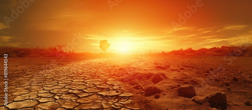 Scorching heatwave intensifies under the blazing sun due to climate change and global warming creating a severe impact on the environment. Copy space image. Place for adding text and design photo