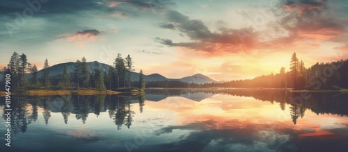Rustic lake landscape at sunset with vintage vibes showcasing symmetrical reflections trees mountains and beautiful skies perfect for a quaint outdoors travel copy space image photo
