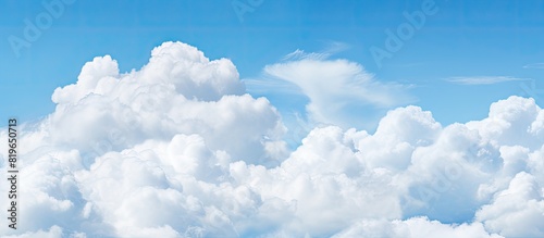 Background of white clouds and blue sky with copy space image