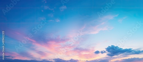 The atmospheric display of the sky and clouds during twilight providing a serene backdrop for silhouettes with a copy space image