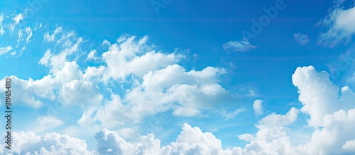 Beautiful blue sky with clouds captured in an image with a calming clear background and copy space image