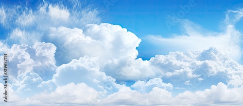 Daytime blue sky with fluffy clouds a perfect copy space image