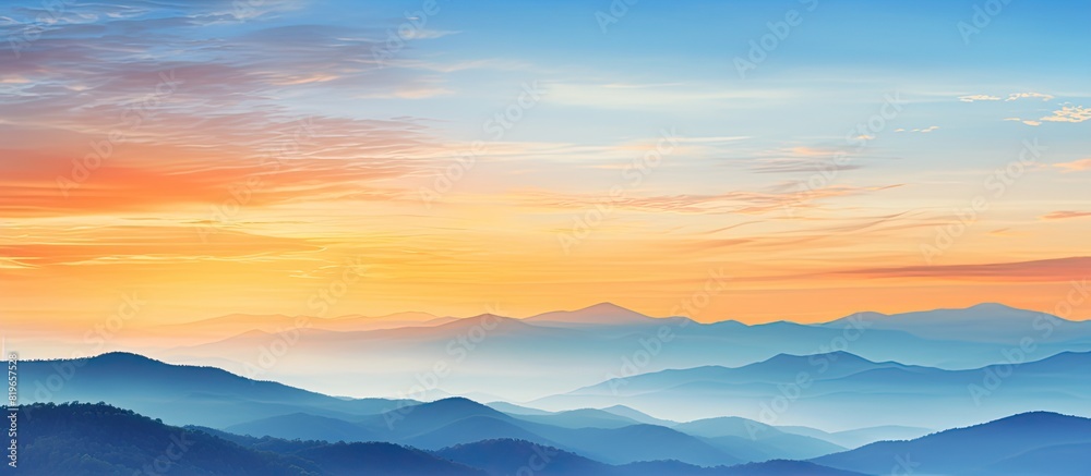 Scenic mountain view at sunset with a colorful blend of blue and orange hues perfect as a copy space image