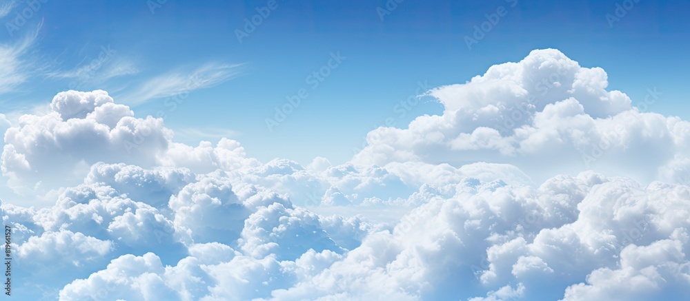 Scenic view of fluffy clouds against a blue sky with copy space image Scenic view of fluffy clouds against a blue sky with copy space image