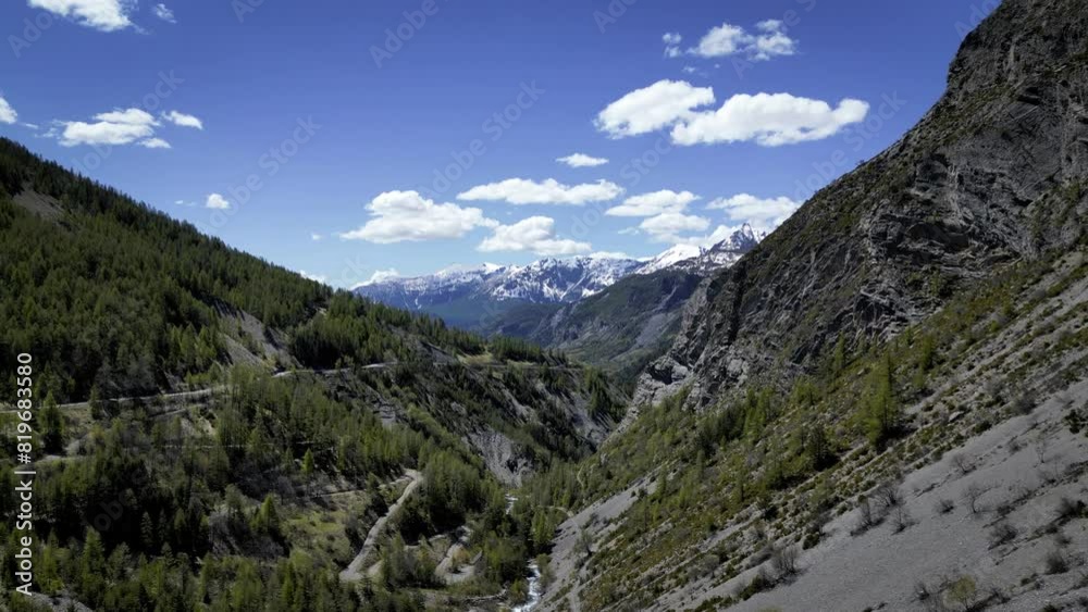 Valley of the mercantour seen on the mountains in the valley, snow on the tip of the mountains. 4K drone video, tourist place Valley of the mercantour seen on the mountains in the valley, snow on the tip of the mountains. 4K drone video, tourist place