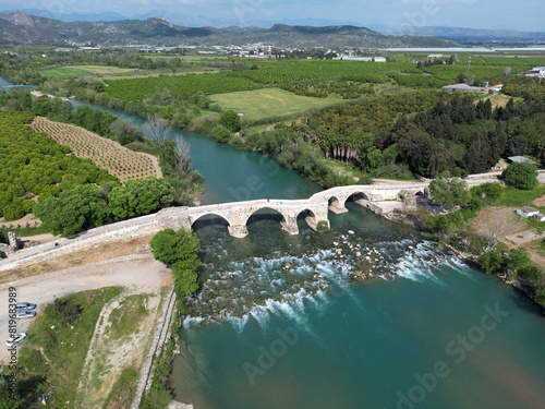 Koprucay Bridge ( Aspendos Bridge ), located in Antalya, Turkey, was built during the Seljuk period. photo