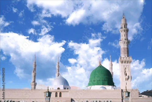 Masjid nabi of Medina. Green dome and moon and clouds flowing in the background. 	 photo