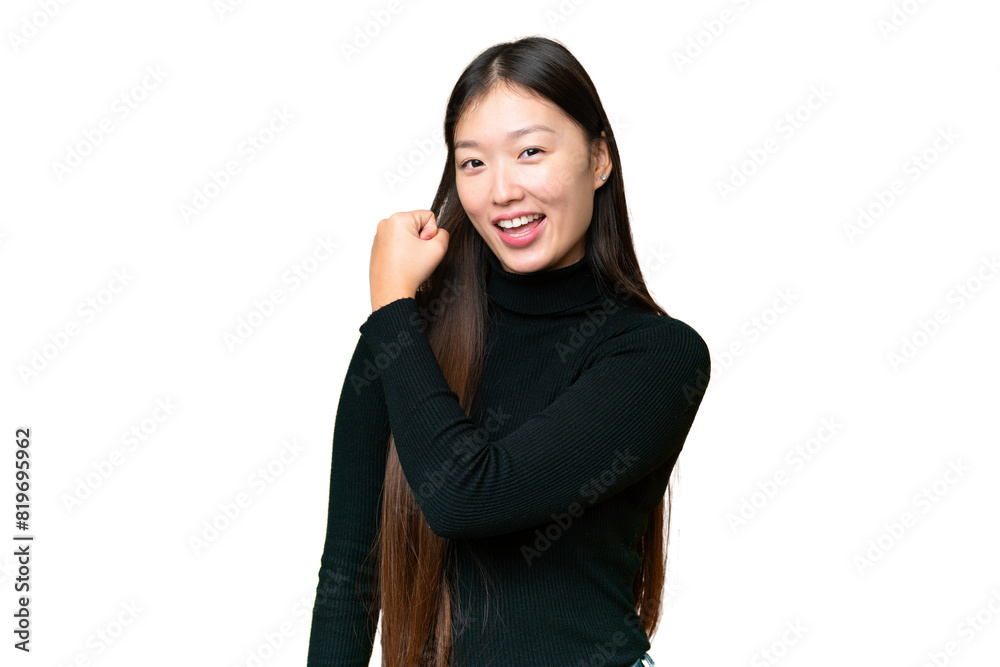 Young Asian woman over isolated chroma key background celebrating a victory Young Asian woman over isolated chroma key background celebrating a victory