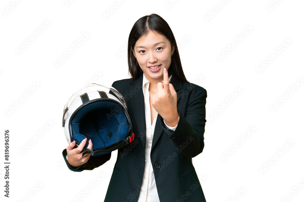 Young Asian woman with a motorcycle helmet over isolated chroma key background doing coming gesture Young Asian woman with a motorcycle helmet over isolated chroma key background doing coming gesture