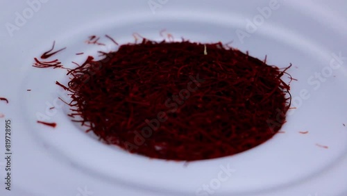 Separating the saffron leaves from inside the saffrons photo