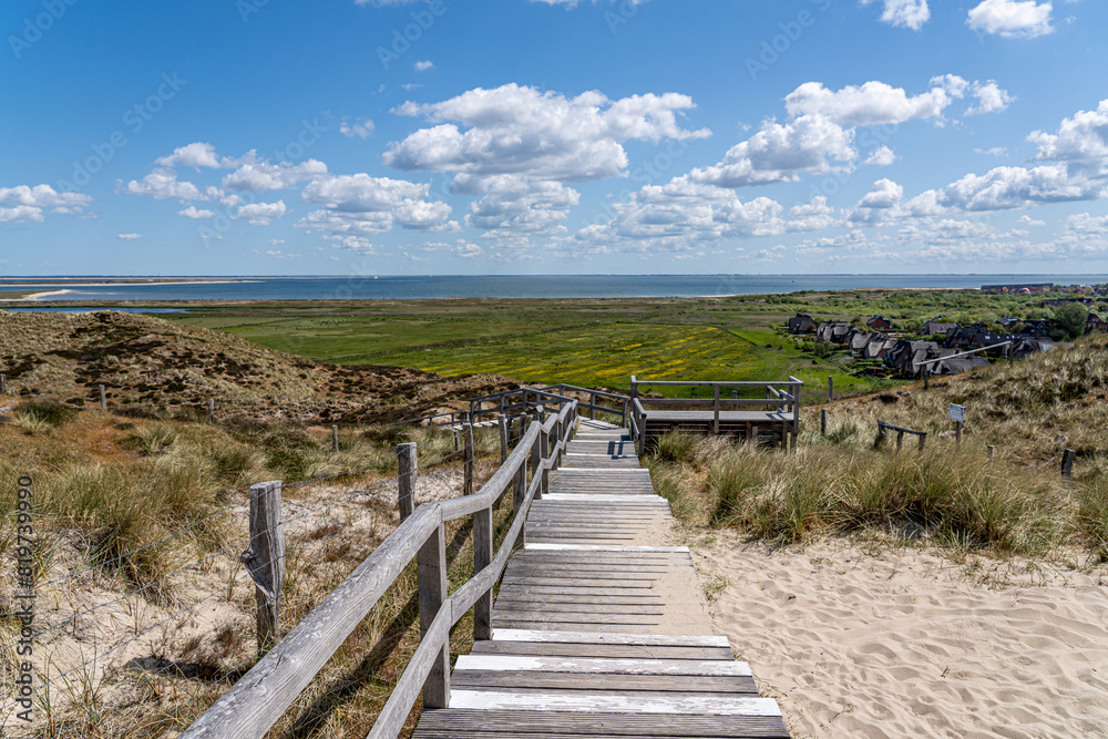 Stairway amidst sand dunes on Sylt Island, Germany, near the Baltic Sea Stairway amidst sand dunes on Sylt Island, Germany, near the Baltic Sea