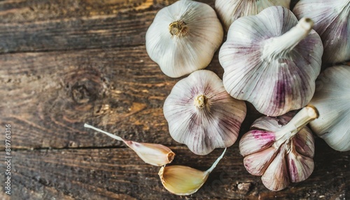  group of garlic close up on the rustic table.