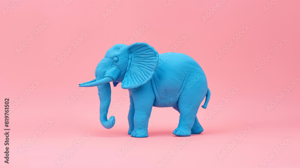 Blue plasticine elephant on pink background. Blue plasticine elephant on pink background.