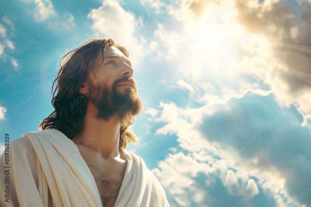 Man in robe in the clouds with sunlights and blue sky Man in robe in the clouds with sunlights and blue sky