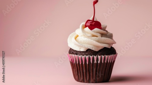 A Single Cherry-Topped Cupcake