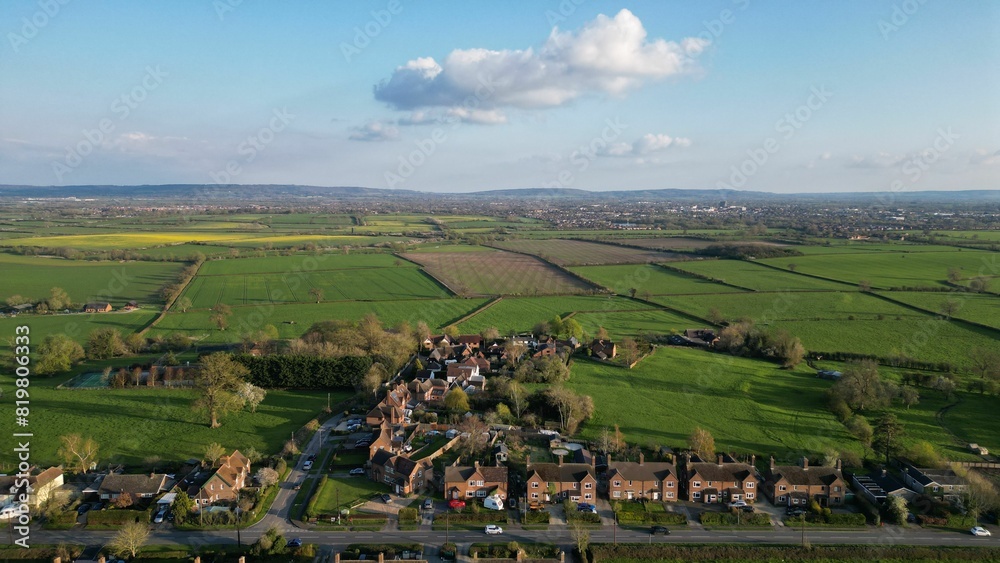 Scenic countryside landscape with lush green fields in the foreground ...