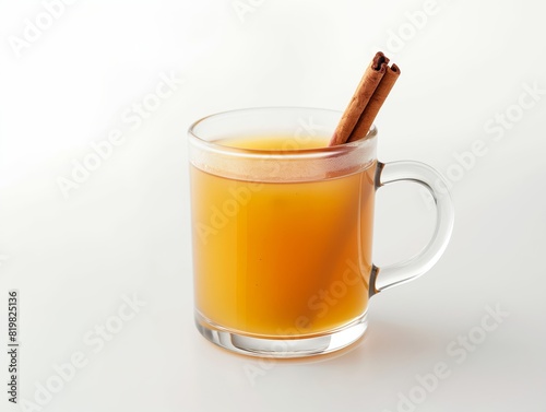 A cup of hot tea with a cinnamon stick in it