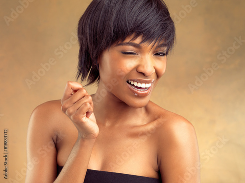 African woman, wink and expression in portrait for dermatology, beauty and trend for skin care or results. Black, female person and style with pride, hair care on background for wellness or cosmetic