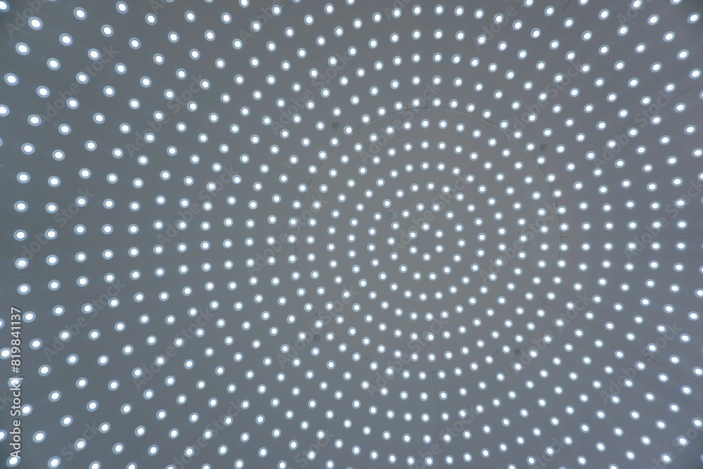 Low angle view of a ceiling full with small lamps Low angle view of a ceiling full with small lamps