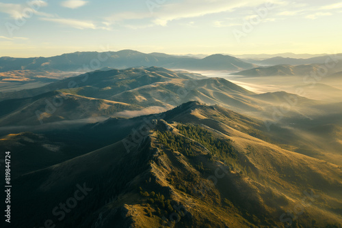 aerial view of mountain range at dawn