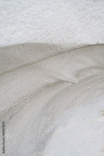 Dune Sand Ripple Closeup Texture in Cold Winter Morning Sunlight with Shallow Depth of Field
