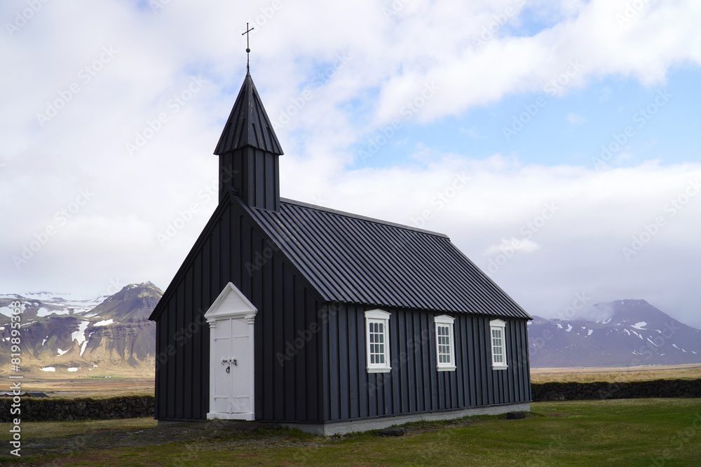 The little clack church of Budir, Budakirkja Beach church. Snaefellsnes peninsula, west Iceland The little clack church of Budir, Budakirkja Beach church. Snaefellsnes peninsula, west Iceland