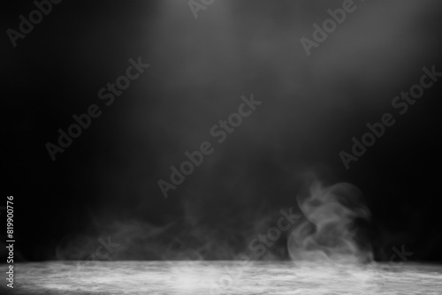 Podium black dark smoke background product platform abstract stage texture fog spotlight. Dark black floor podium dramatic empty night room table concrete wall scene place display studio smoky dust. photo