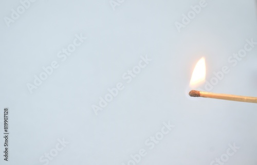 red head matchstick lighting isolated on in white background photo