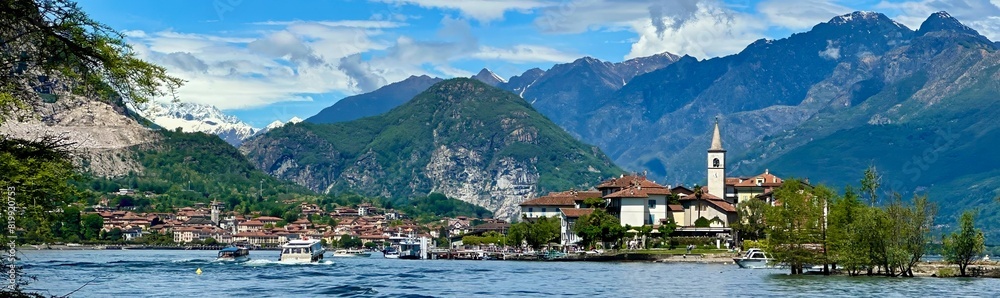Stunning View of Isola dei Pescatori and Baveno with Majestic Mountain Backdrop on Lake Maggiore, Verbano-Cusio-Ossola, Piedmont, Italy Stunning View of Isola dei Pescatori and Baveno with Majestic Mountain Backdrop on Lake Maggiore, Verbano-Cusio-Ossola, Piedmont, Italy