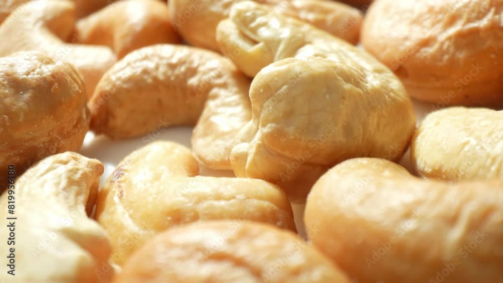 Savor the allure of roasted cashew nuts, boasting an even roast and a golden-brown complexion. Their enticing texture, marked by delicate wrinkles, promises a delectable crunch in every bite.
Savor the allure of roasted cashew nuts, boasting an even roast and a golden-brown complexion. Their enticing texture, marked by delicate wrinkles, promises a delectable crunch in every bite.