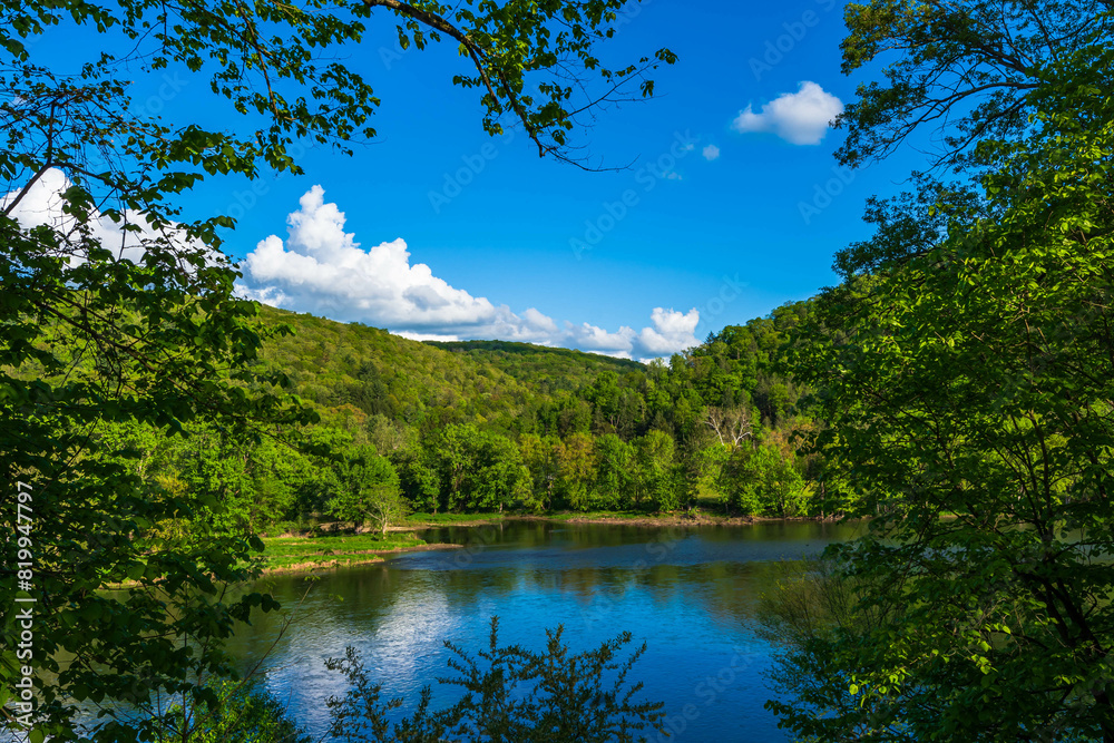 A landscape view of the Allegheny River in Deerfield Township, Pennsylvania, USA on a sunny spring day A landscape view of the Allegheny River in Deerfield Township, Pennsylvania, USA on a sunny spring day