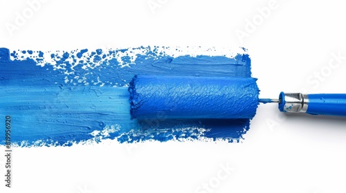 Paint Roller with Blue Paint. photo