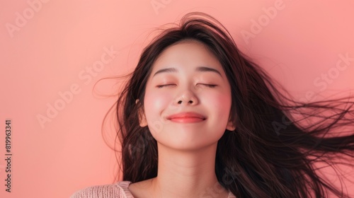 Serene Woman with Closed Eyes photo