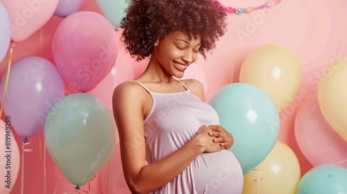 Radiant Pregnant Woman with Balloons photo