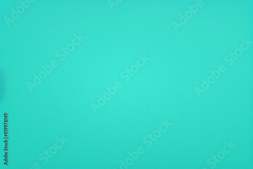 trama di sfondo blu scuro con vignetta nera in vecchio design vintage con bordi testurizzati, parete color verde acqua scuro ed elegante con riflettori luminosi al centro. photo