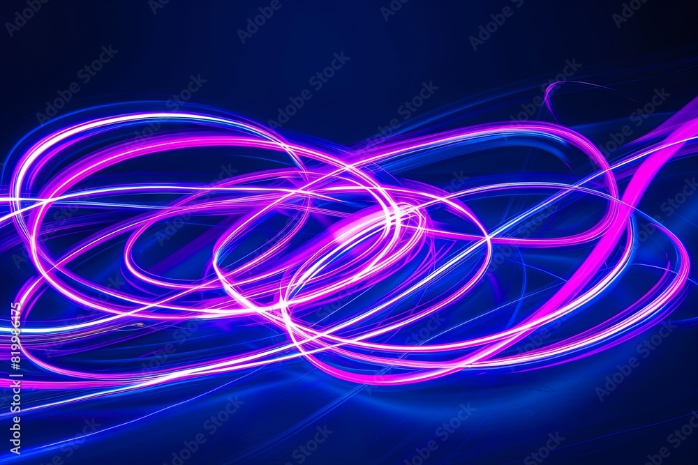Vibrant neon light trails on dark blue background Vibrant neon light trails on dark blue background
