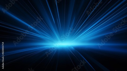 Abstract blue light rays on a dark background