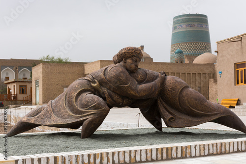 Modern sculpture of Kurash wrestlers at the square of Itchan-kala photo