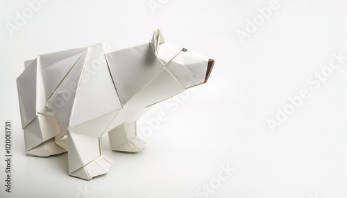 Animal concept origami isolated on white background of polar bear - ursus maritimus, with copy space, simple starter craft for kids