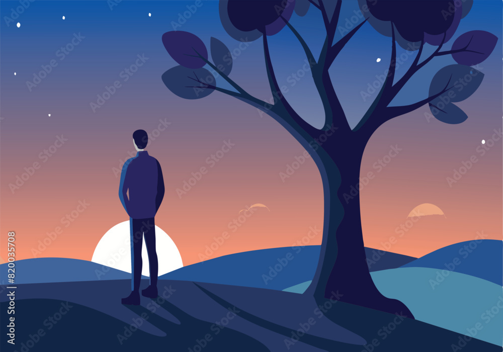A man stands in front of a tree at sunset