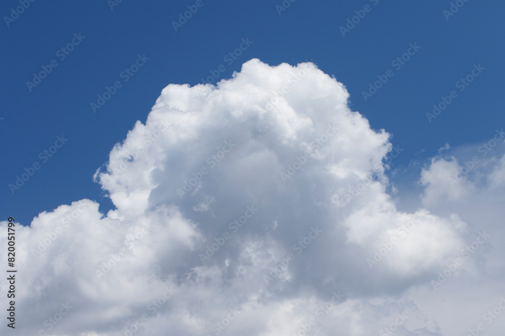 White clouds in blue sky in a spring day White clouds in blue sky in a spring day