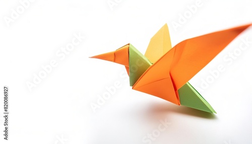 animal bird avian concept origami isolated on white background of a cute  adorable  hummingbird  with copy space  simple starter craft for kids
