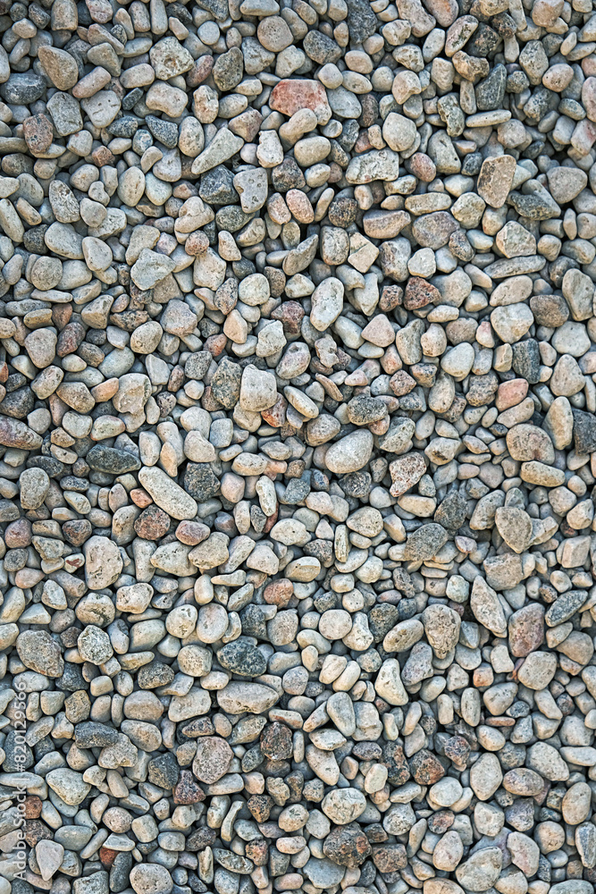 background of small stones. abstract natural texture of gray pebble stones. Many grunge construction rocks. template for design. full frame, flat lay background of small stones. abstract natural texture of gray pebble stones. Many grunge construction rocks. template for design. full frame, flat lay