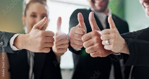 Thumbs up, teamwork and hands of business people in office for feedback, good news and agreement. Corporate, professional and men and women with gesture for thank you, support and collaboration photo