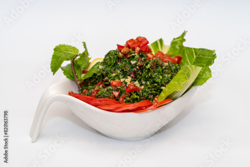 High-Resolution Stock Image of Salad with Red Pepper, Lettuce,mint,and Tomato