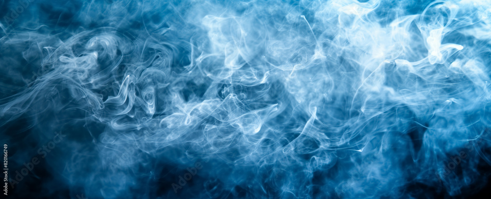 Swirling mass of smoke in blue tones, creating a mysterious and ethereal atmosphere against a dark background Swirling mass of smoke in blue tones, creating a mysterious and ethereal atmosphere against a dark background